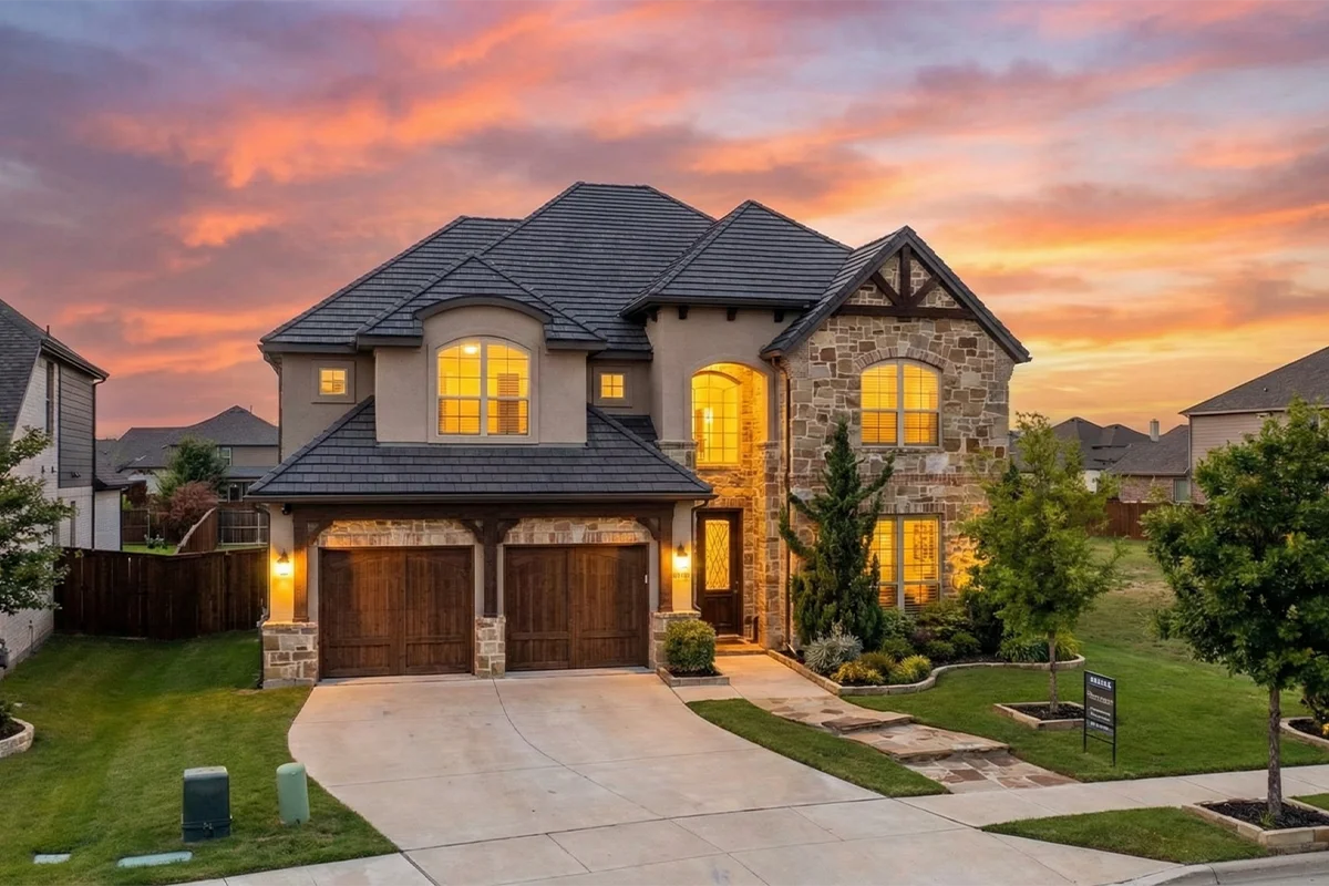 DFW Homes For Sale Stone Exterior Luxury Home at Sunset Dallas Fort Worth TX